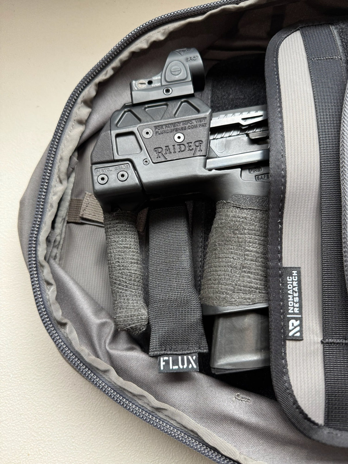 Elastic mag sleeves mounted inside a Raid Pack
