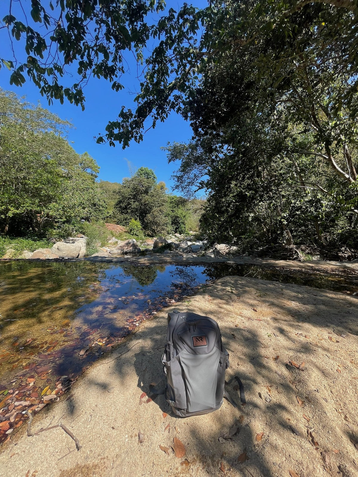 HD Raid Pack 2.0 in Wolf Gray at a creek crossing